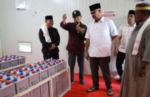 Bupati Resmikan Listrik Komunal, ‘Terang Kampungku’ di Desa Tani Baru Terealisasi